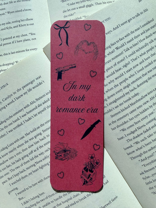 "𝐼𝓃 𝓂𝓎 𝒹𝒶𝓇𝓀 𝓇𝑜𝓂𝒶𝓃𝒸𝑒 𝑒𝓇𝒶" bookmark